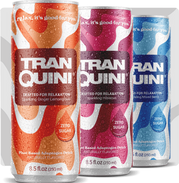 Three cans of Tranquini relaxation beverages are displayed, each covered in water droplets. The Variety Pack includes Sparkling Ginger Lemongrass, Sparkling Hibiscus, and Sparkling Mixed Berry flavors. Each can states "Zero Sugar" and "Plant Based Adaptogens.